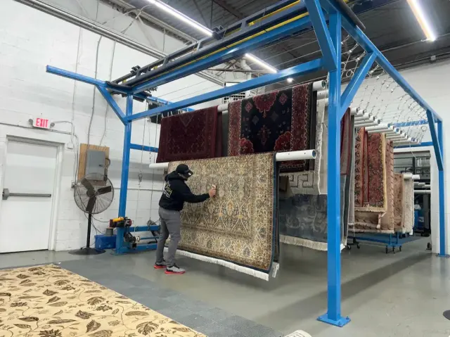 Oriental rugs hung to dry after washing